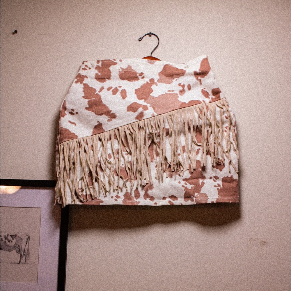 cow fringe mini denim skirt